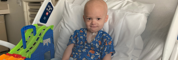 Noah in his hospital bed