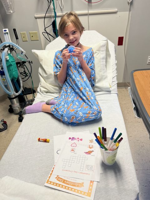 Alice keeping busy with puzzles and worksheets during treatment