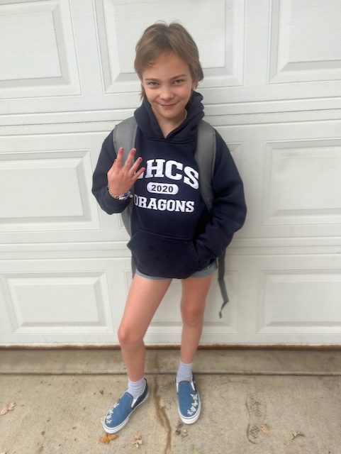 Alice posing for her first day of fourth grade