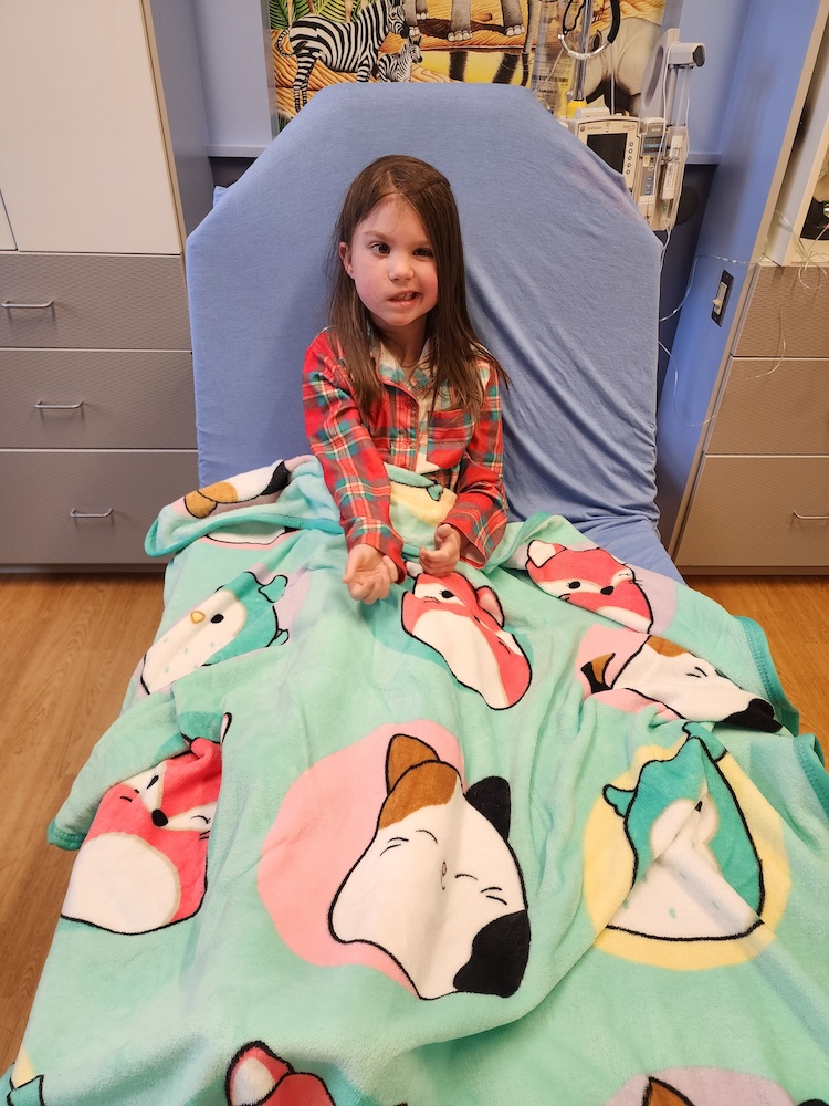 Eva in her hospital bed