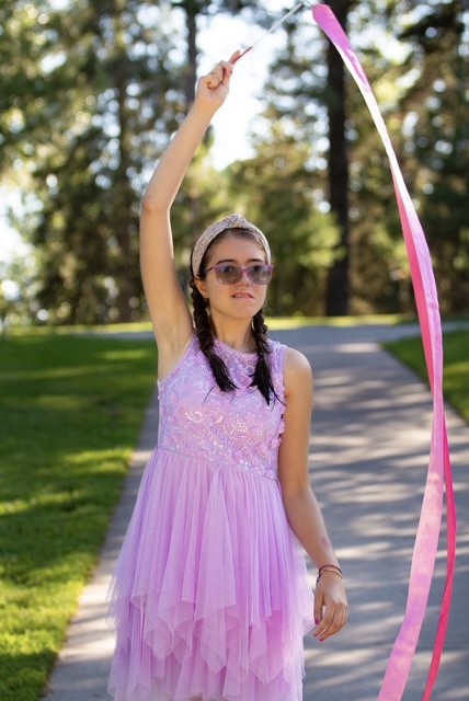 Anikah posing for her talent show act at Camp Norden